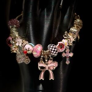 Elegant Charm Bracelet with Pink and Gold Accents